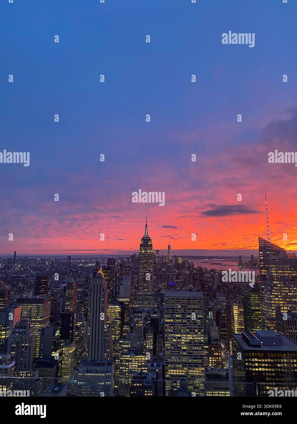 New York City skyline at sunset with the Empire State Building, view ...