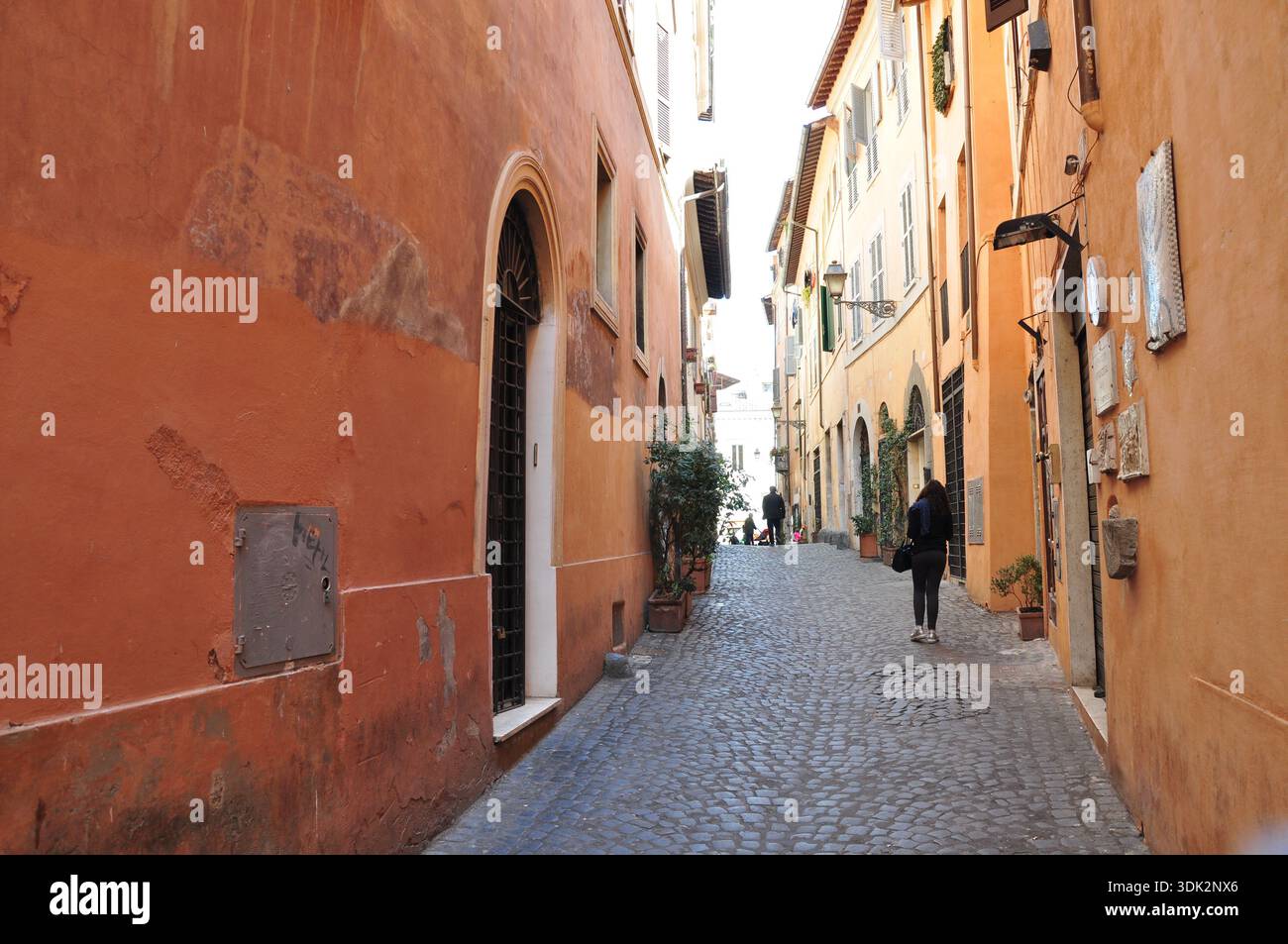 Cobblestone Walk Rome Narrow street in rome pedestrians hi-res stock photography and images ...