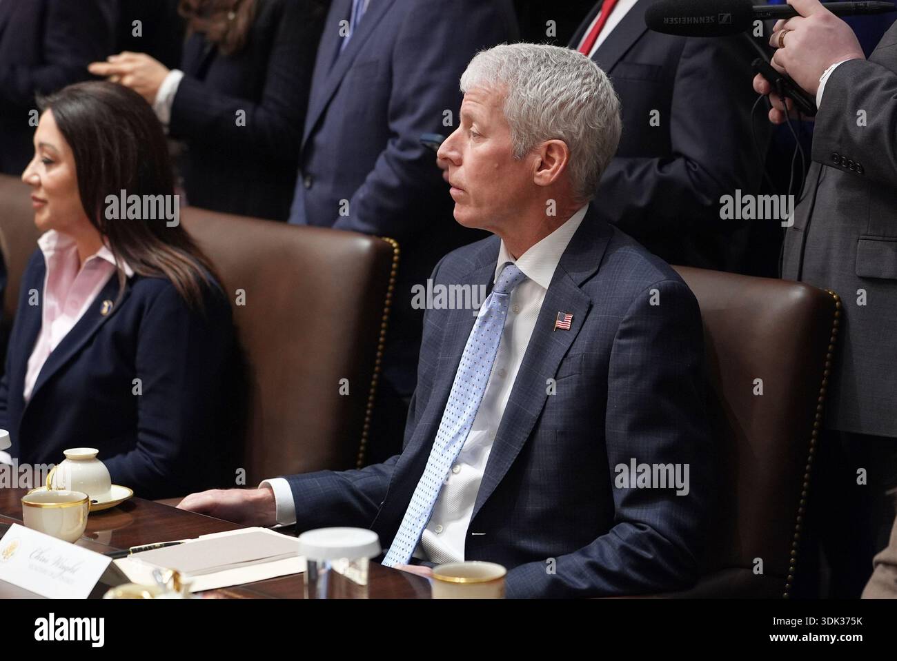 Energy Secretary Chris Wright listens as President Donald Trump speaks ...