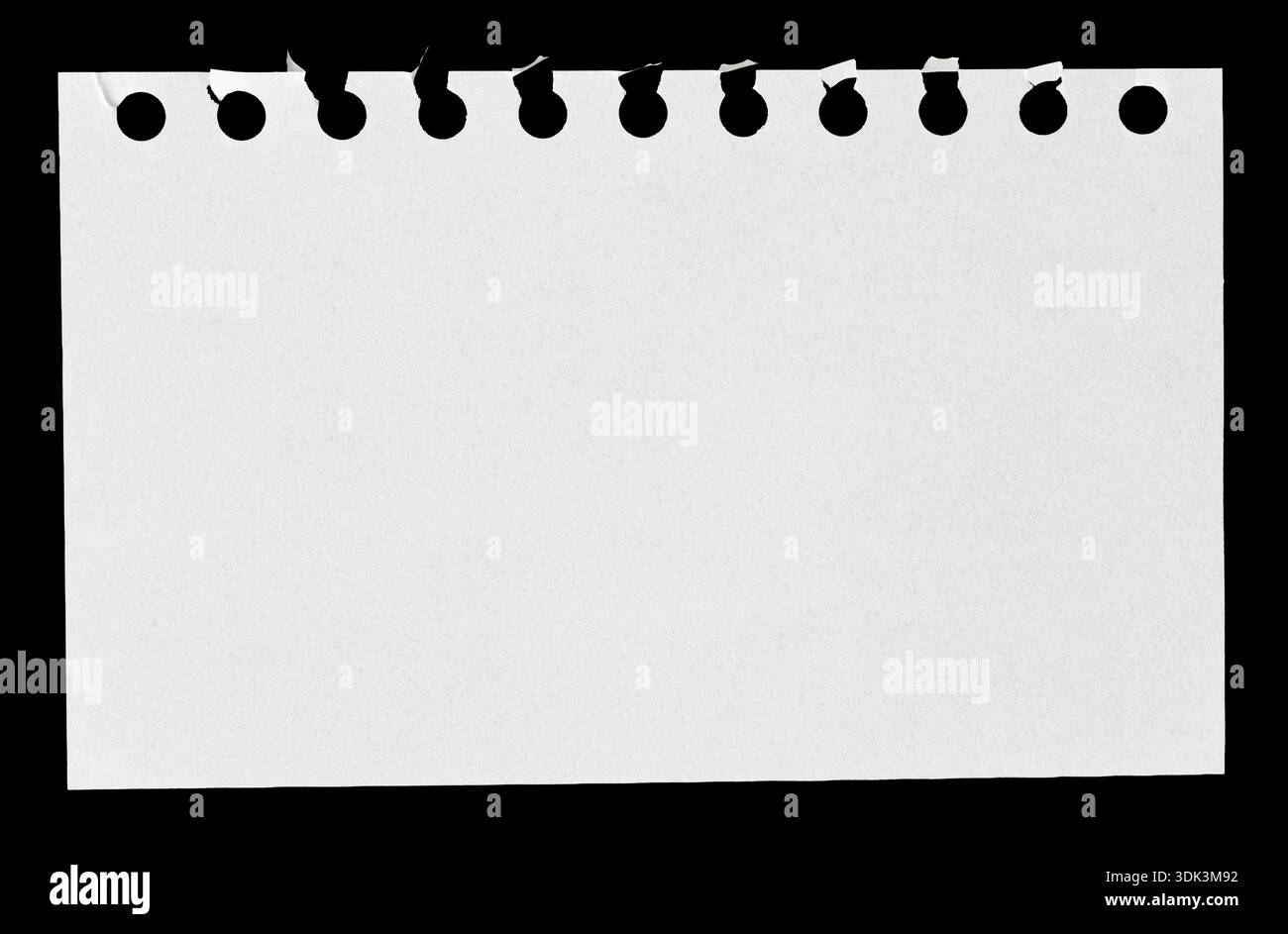 Torn Spiral Notebook Page isolated on black Background Stock Photo