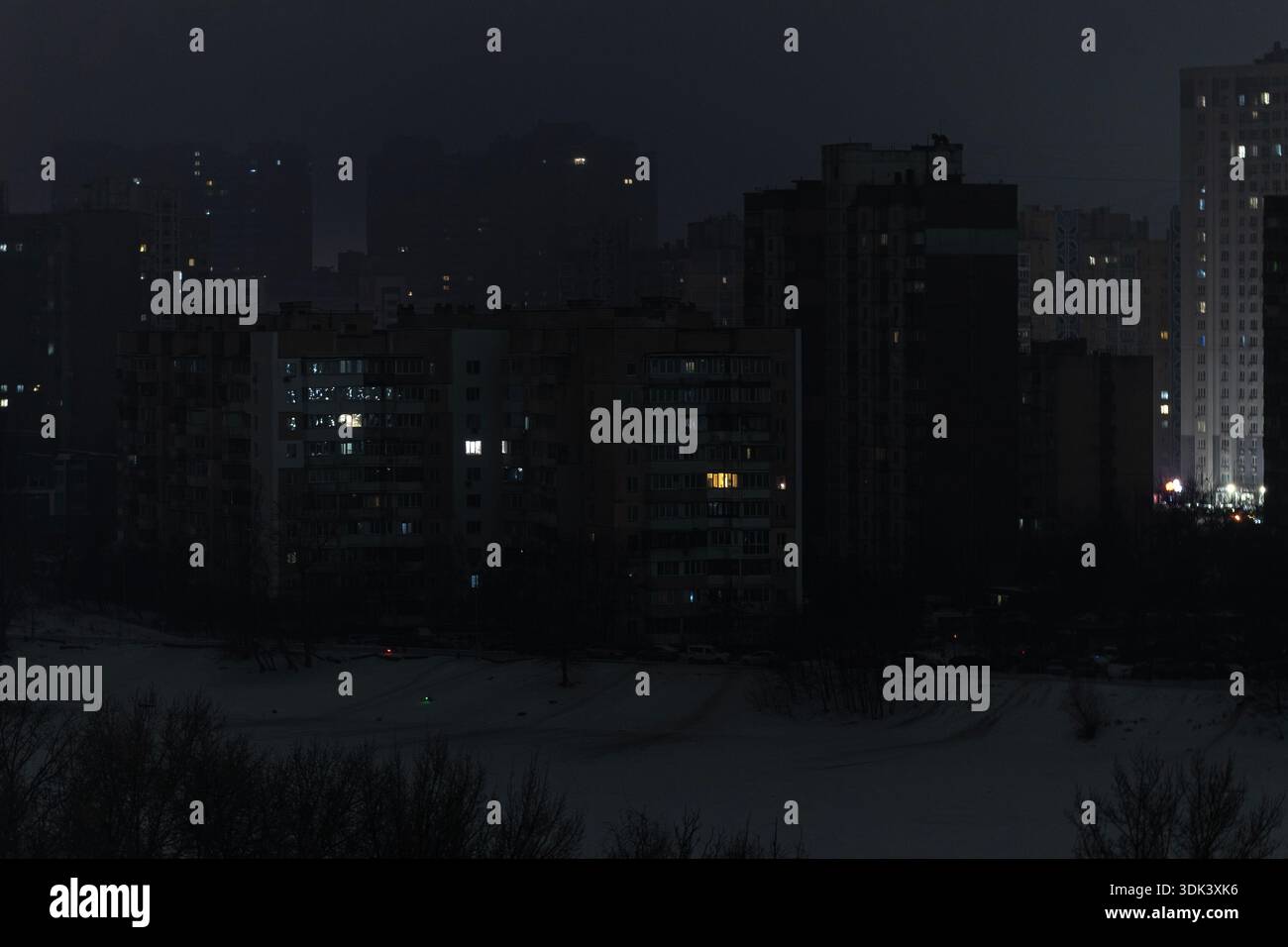 Dark residential buildings in Kyiv during total night blackout. Rare ...