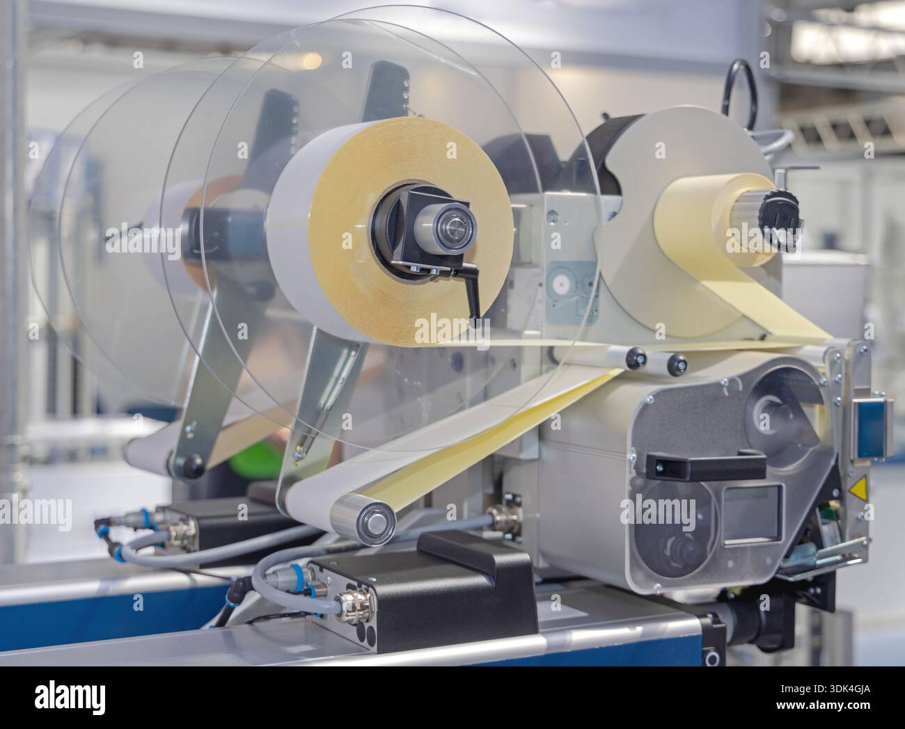 Automatic Labeler Machine at Conveyor System in Factory Production ...