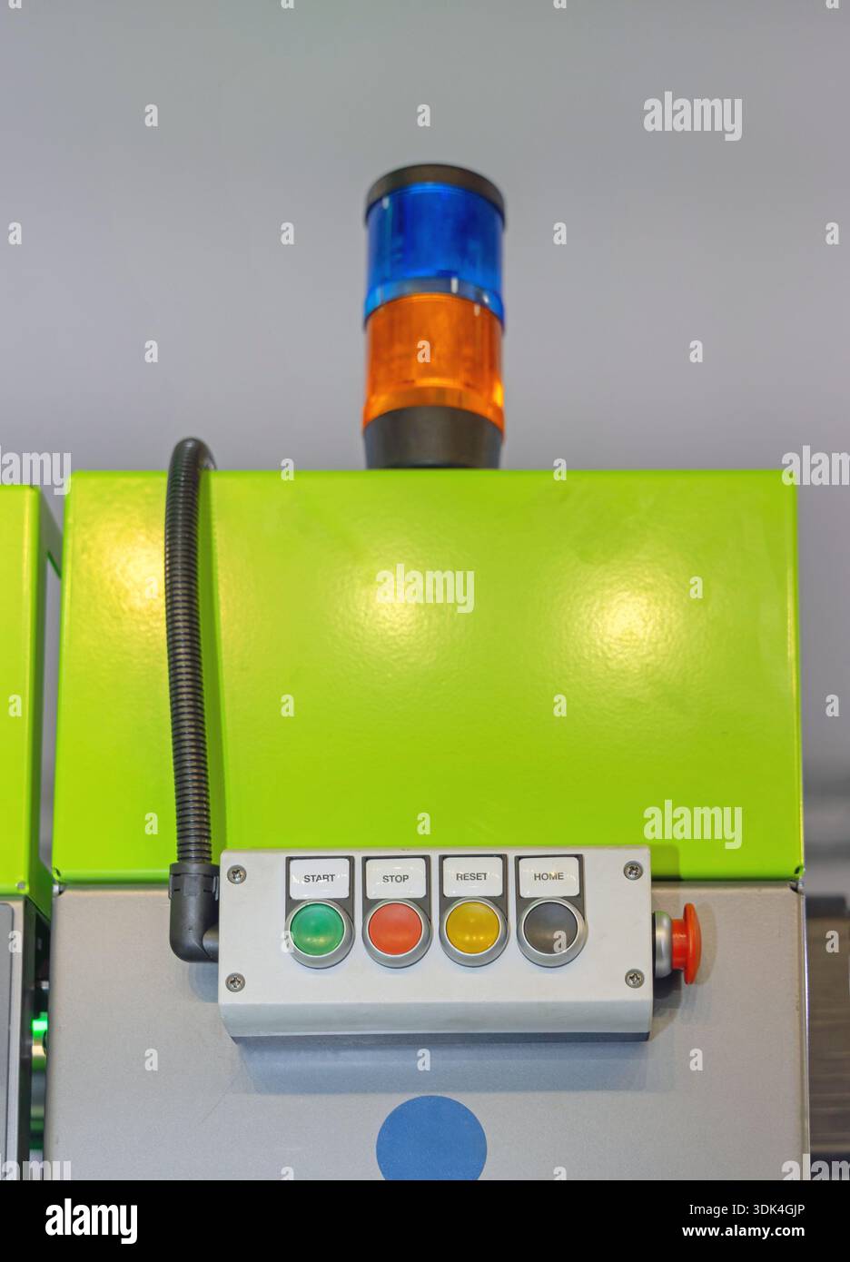 Machine Control Push Buttons Start Signal Stack Lights at Top Stock Photo