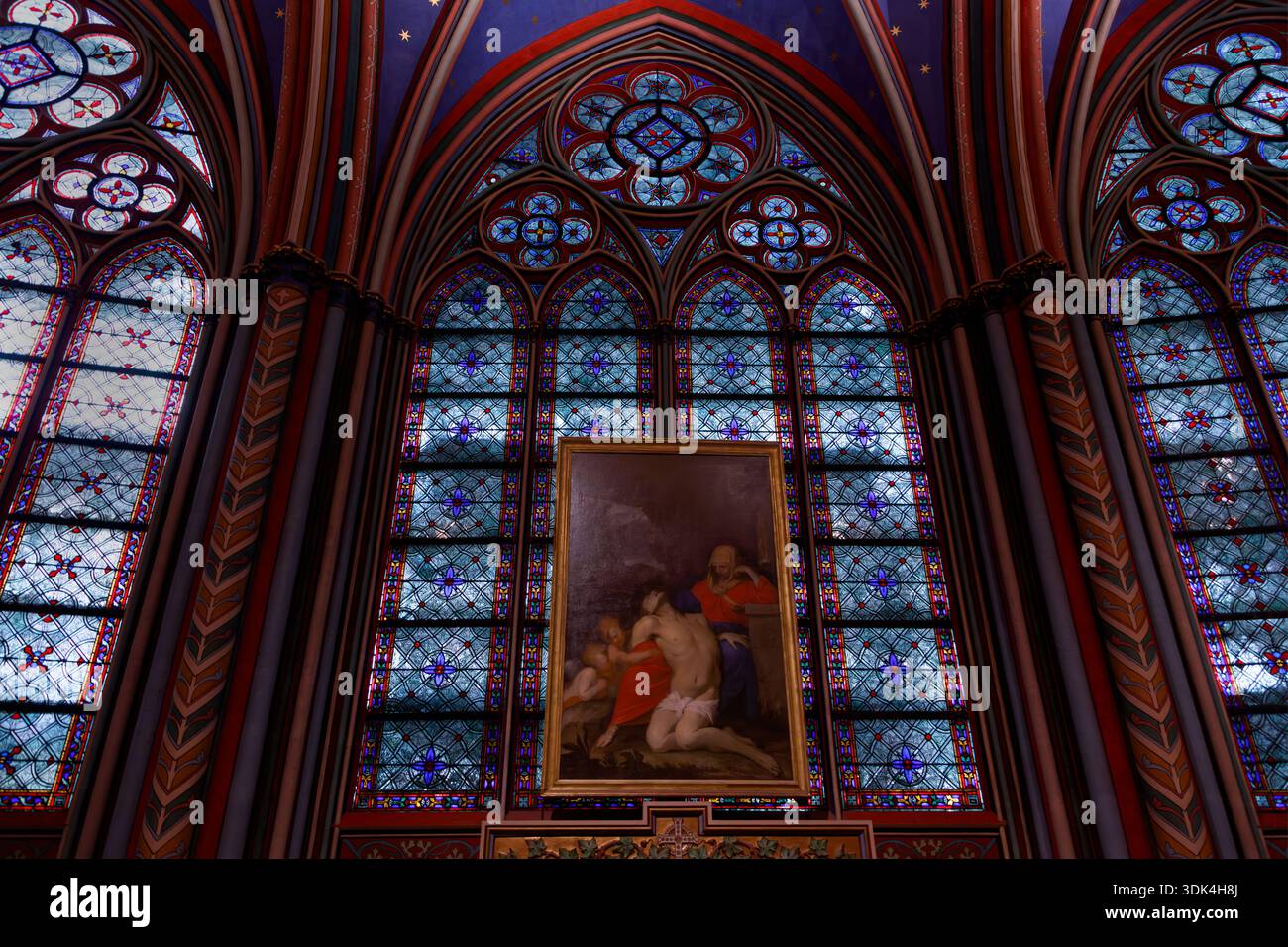 A painting of a fallen Jesus Christ in Notre Dame Cathedral graces a ...
