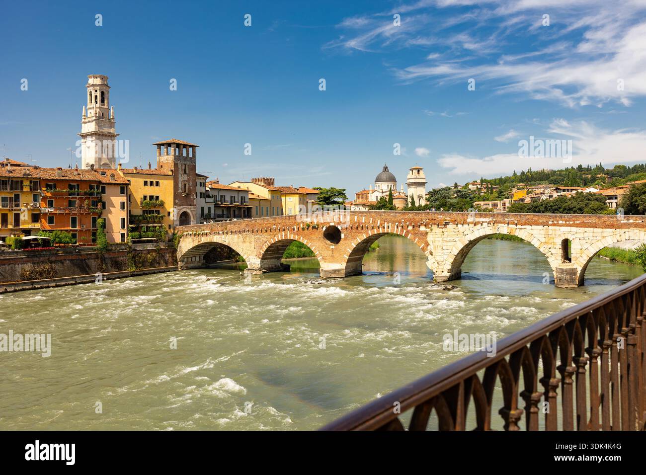 Ponte Pietra is Roman arch bridge over Adige river in the Italian city ...