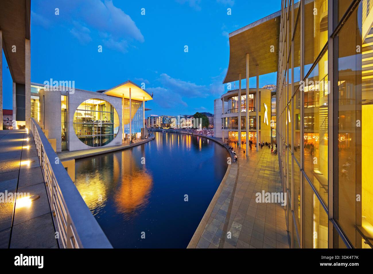View of the River Spree between Marie-Elisabeth-Lueders-Haus and Paul-Loebe-Haus in the evening, Germany, Berlin Stock Photo