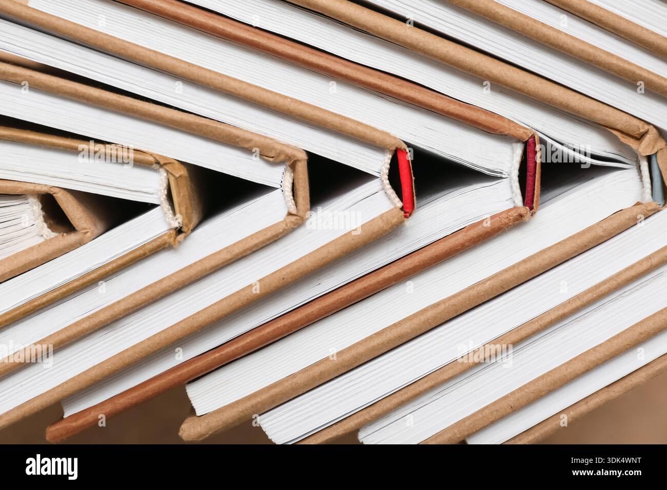 Many different half open books as background, top view Stock Photo