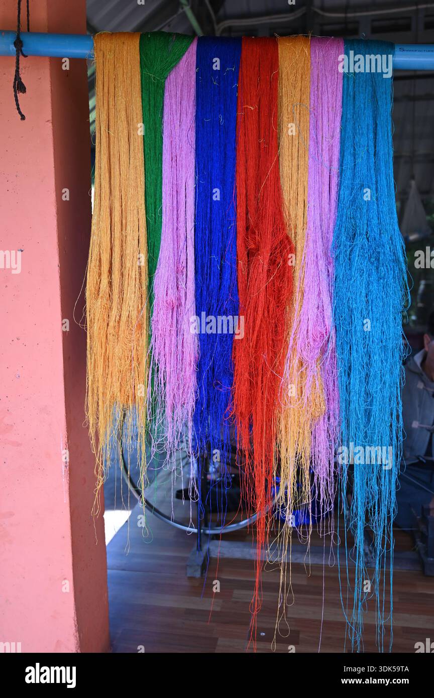 A closeup of silk threads after being colored in the local artisan shops on Silk Island near Phnom Penh, Cambodia Stock Photo