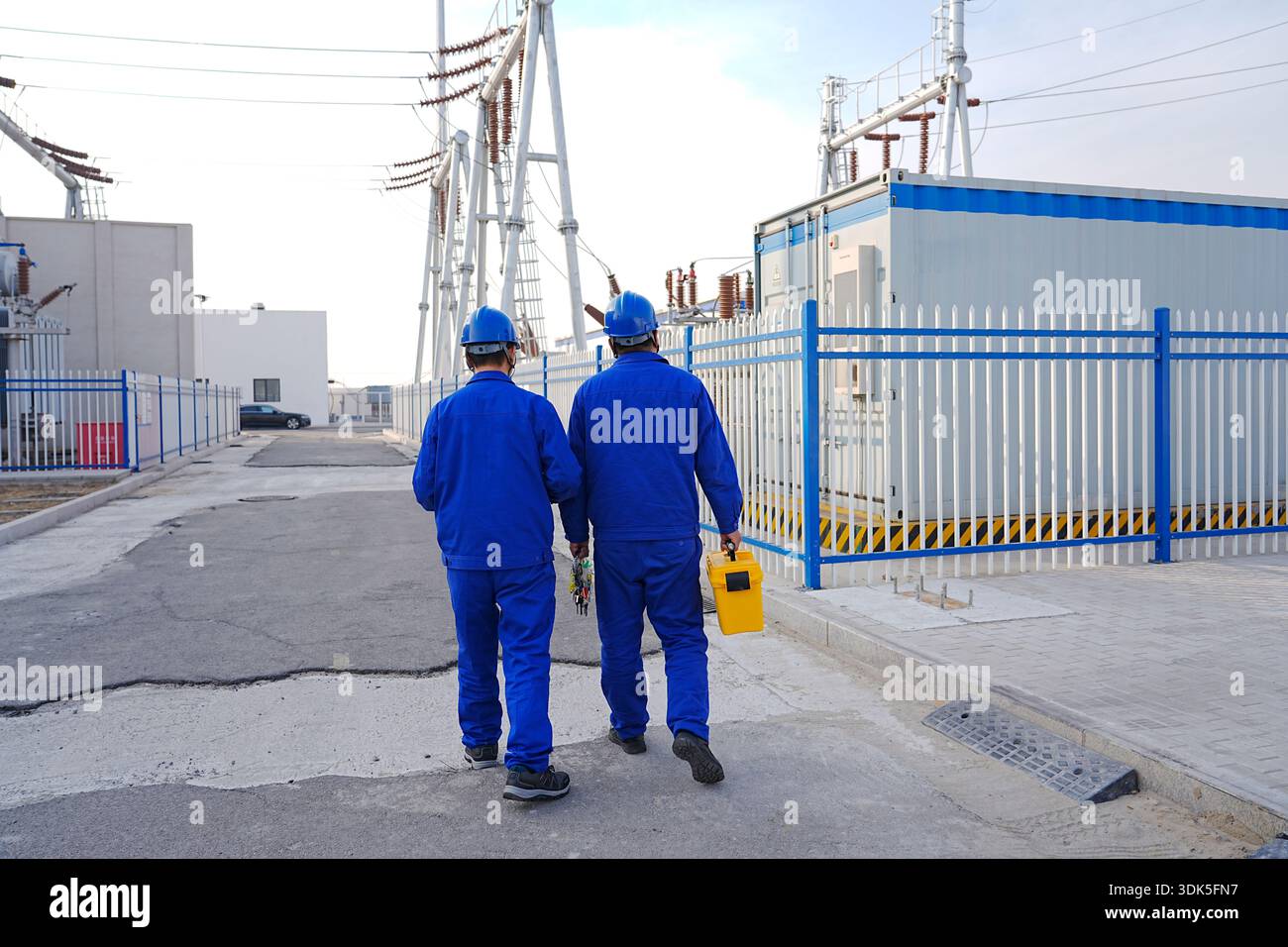 The power workers are conducting work inspections Stock Photo
