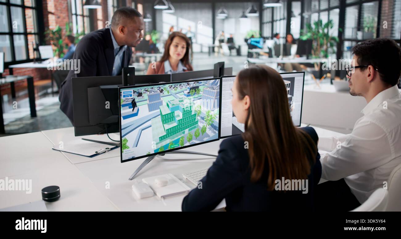 Engineers On GIS Team Using Design Software For Mapping Land. Stock Photo