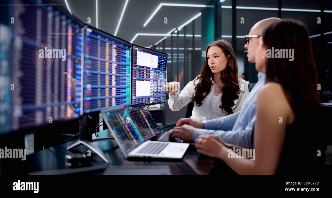 Analyzing Data On Desktop To Create Report With Diverse Team. Stock Photo