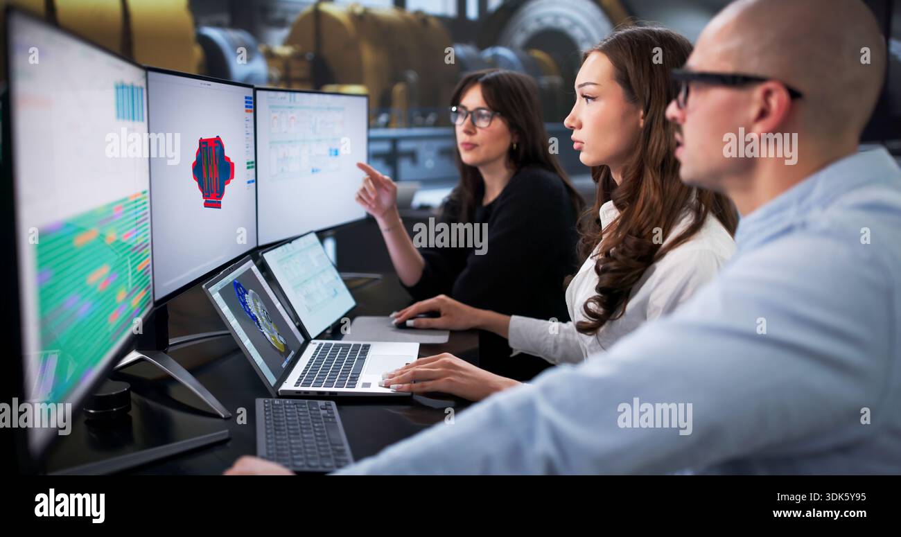 Industrial Engineers Using 3D Software To Do Gas Turbine Maintenance. Stock Photo
