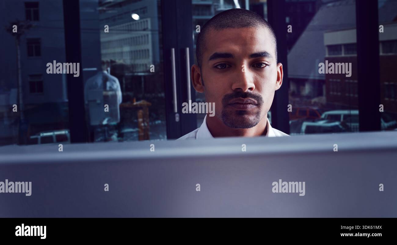 Night, man and developer in office with computer, programming and cloud computing for cybersecurity. Late, person and coding in workplace with desktop Stock Photo