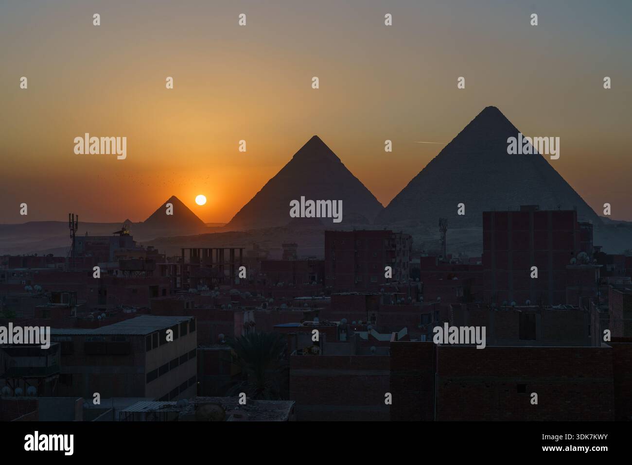 Sunset behind the Pyramids of Giza, Egypt Stock Photo - Alamy