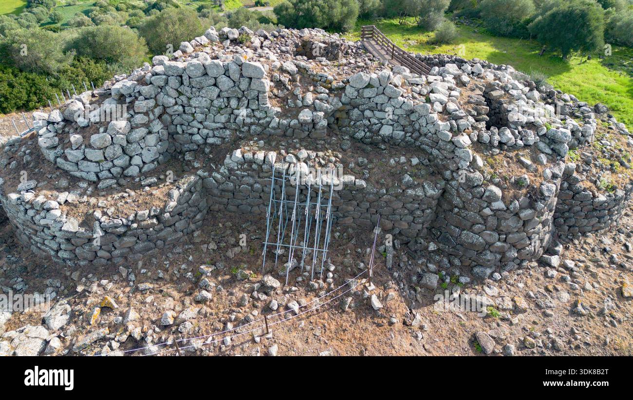 Aerial view of an ancient nuraghe stone structure, prehistoric ruins ...