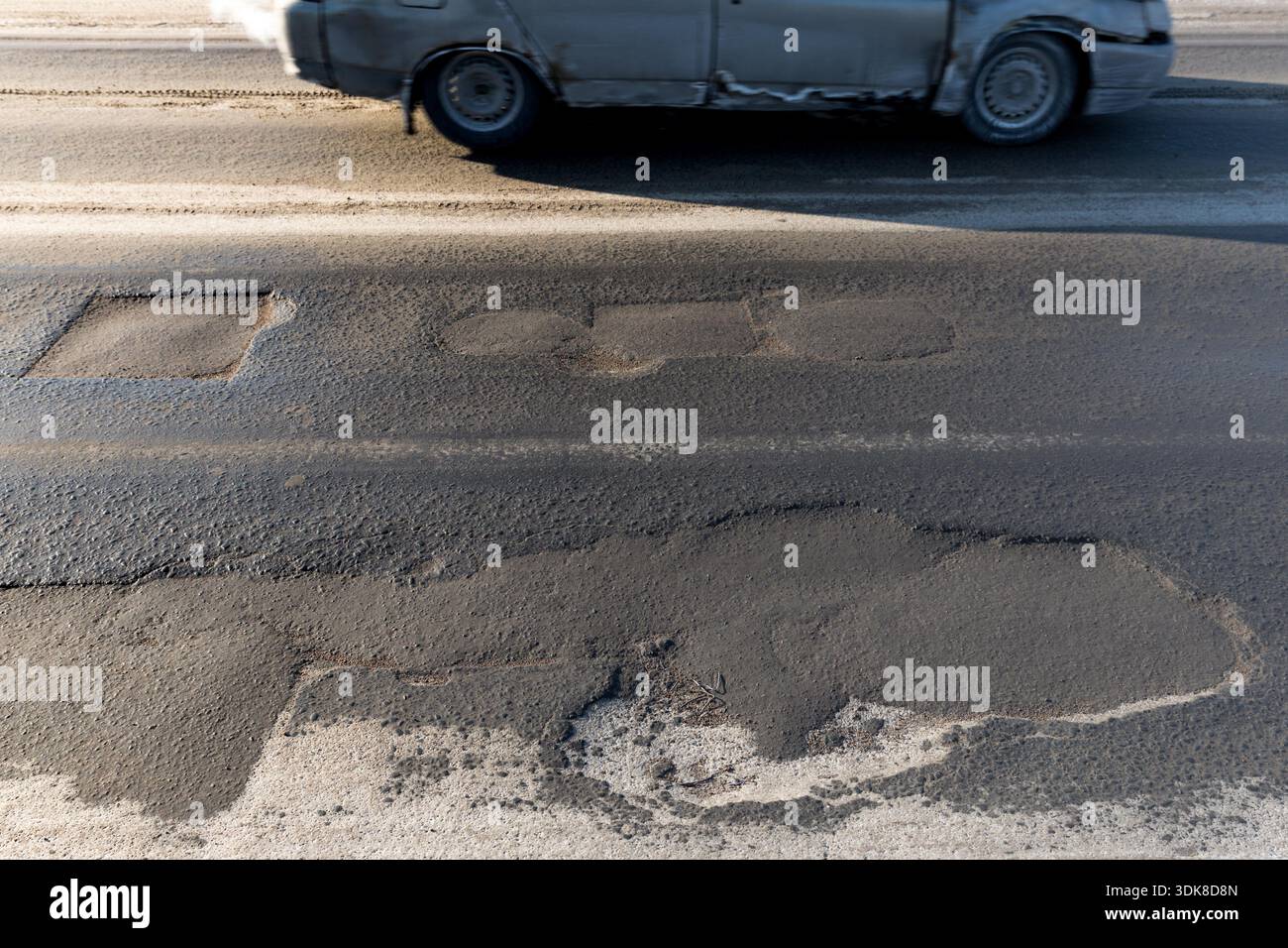 Rut on asphalt road in city, substandard asphalt, Road requiring repair ...