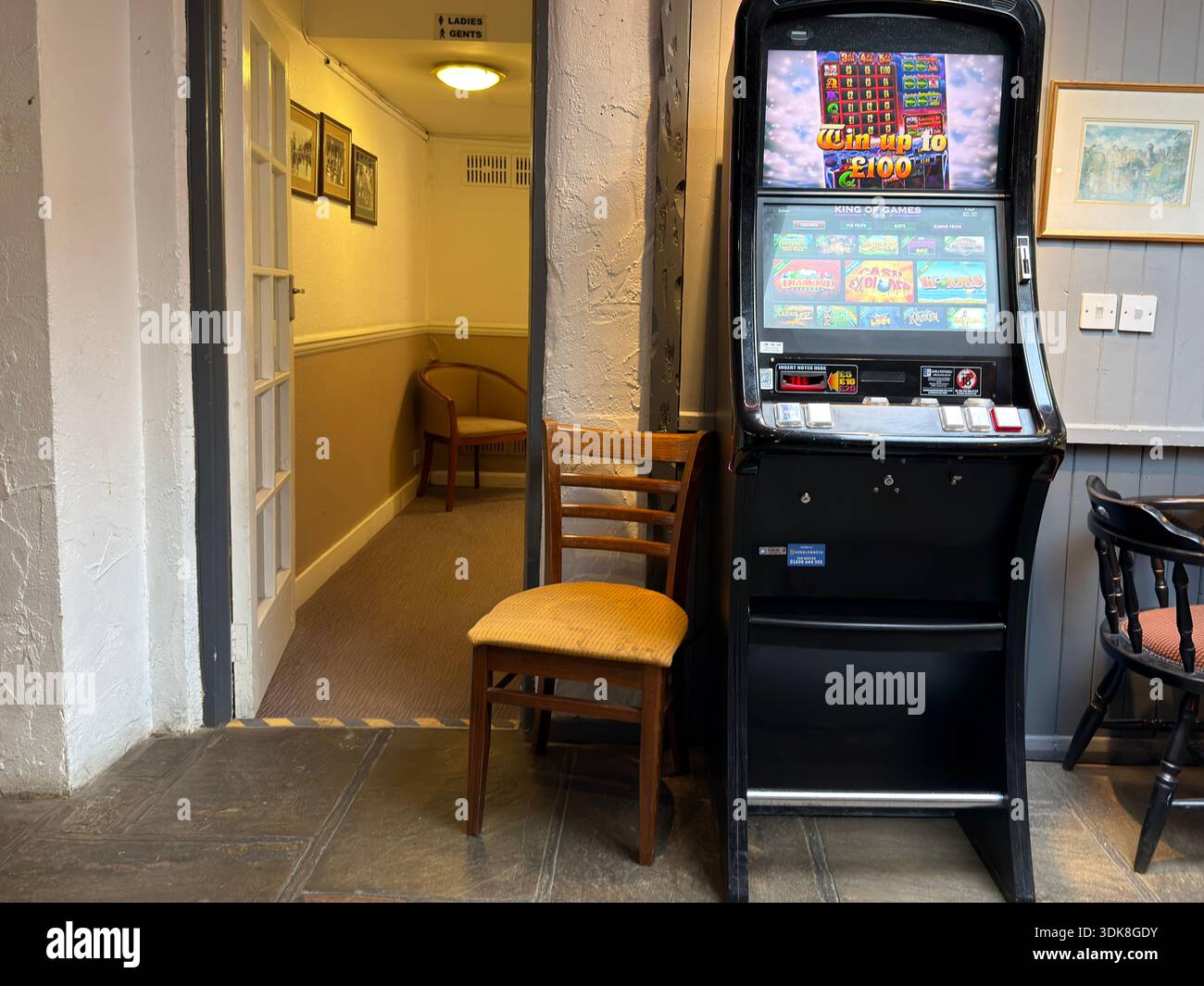 Garbling Machine Electronic lottery gambling machine in a British pub interior, showing ...