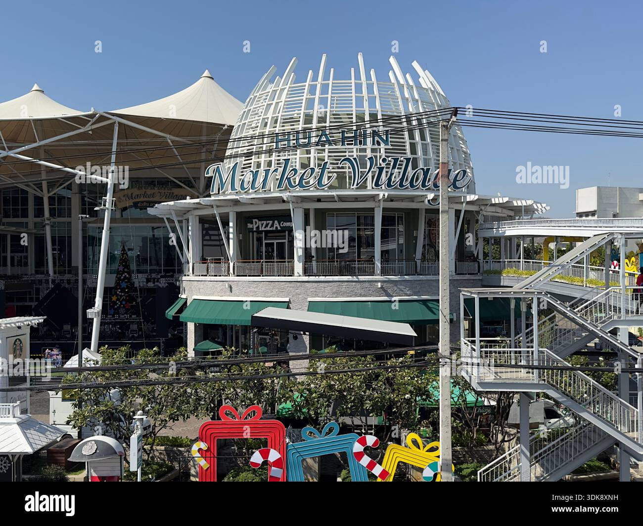 Hua Hin, Thailand - Dec 31, 2023: Hua Hin Market Village shopping center exterior. - Smartphone Captured Stock Image