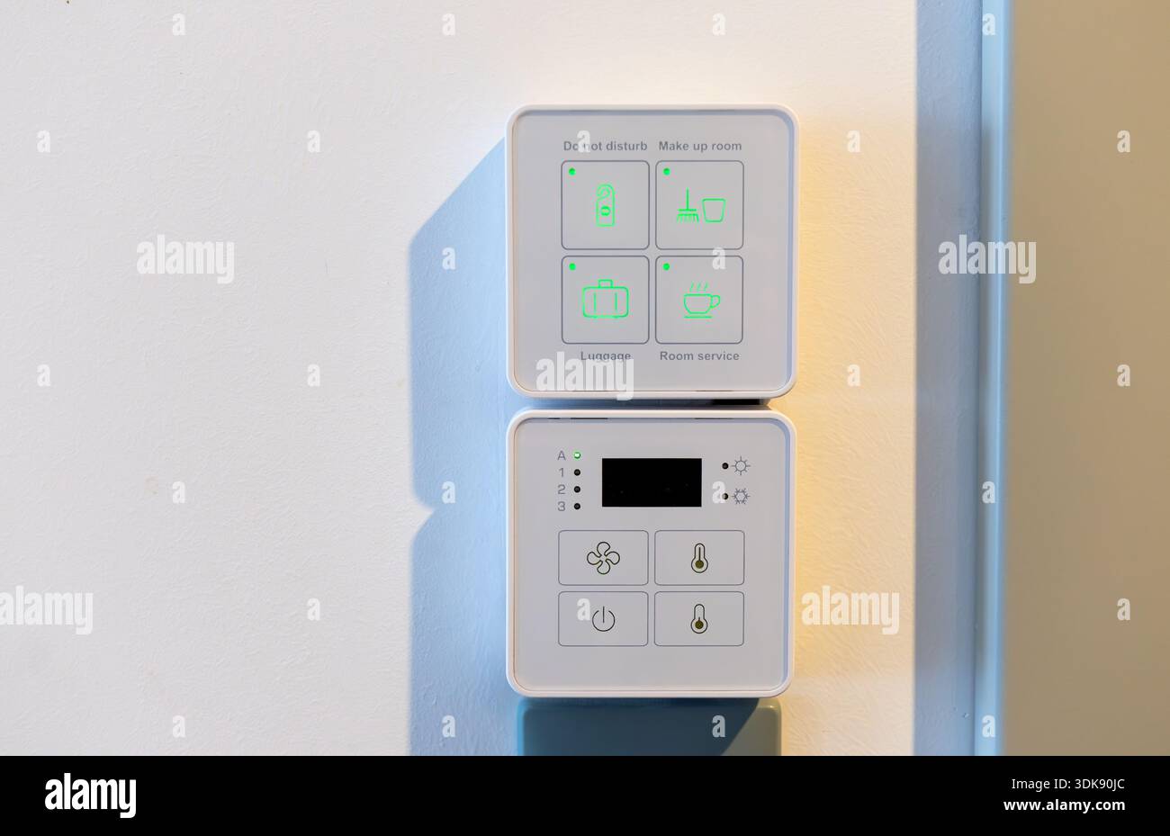 Hospitality and travel concept showing convenient room automation, energy control, and user friendly hotel interior systems for a comfortable stay. Stock Photo