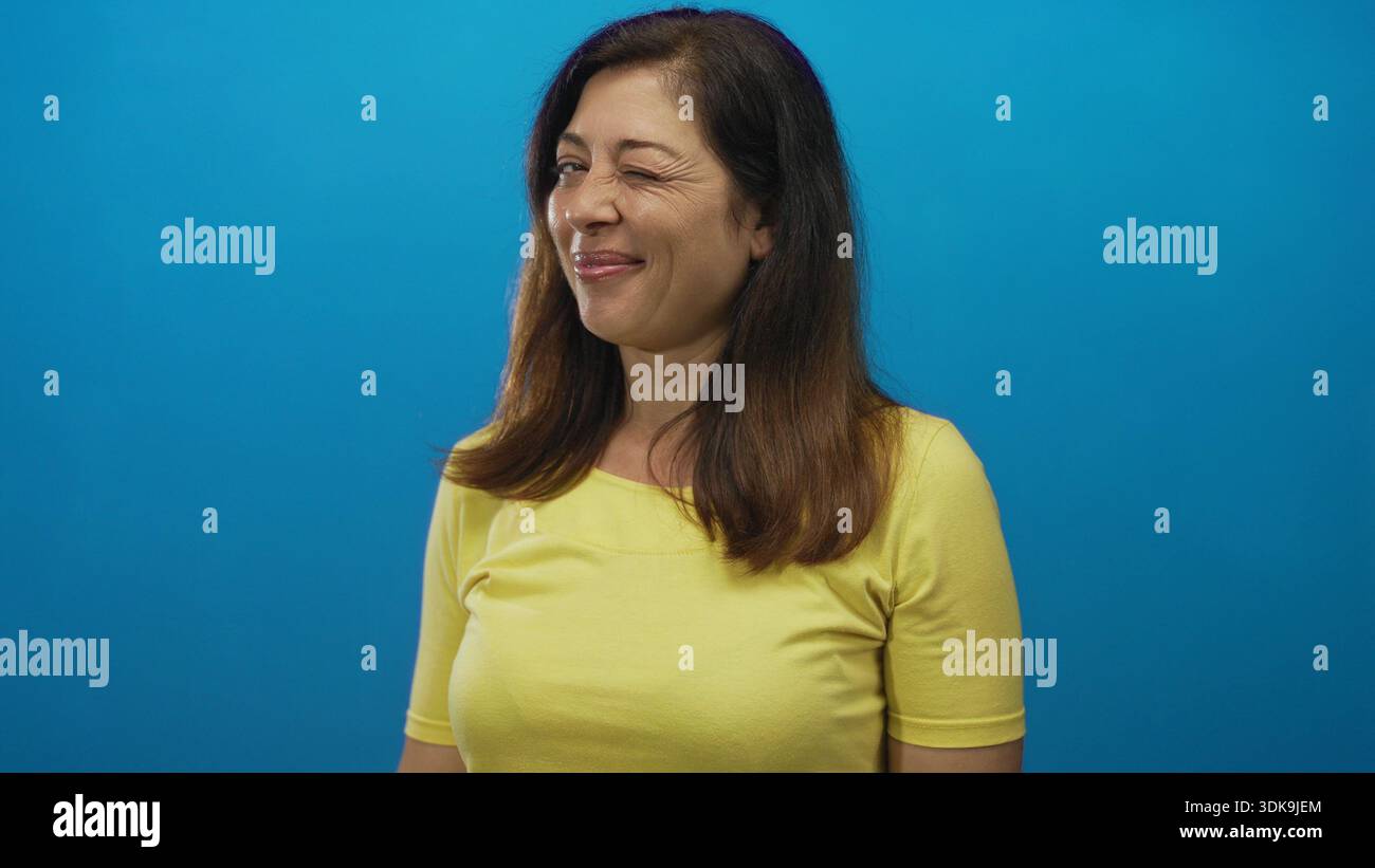 Woman winking subtle smile hi-res stock photography and images - Alamy