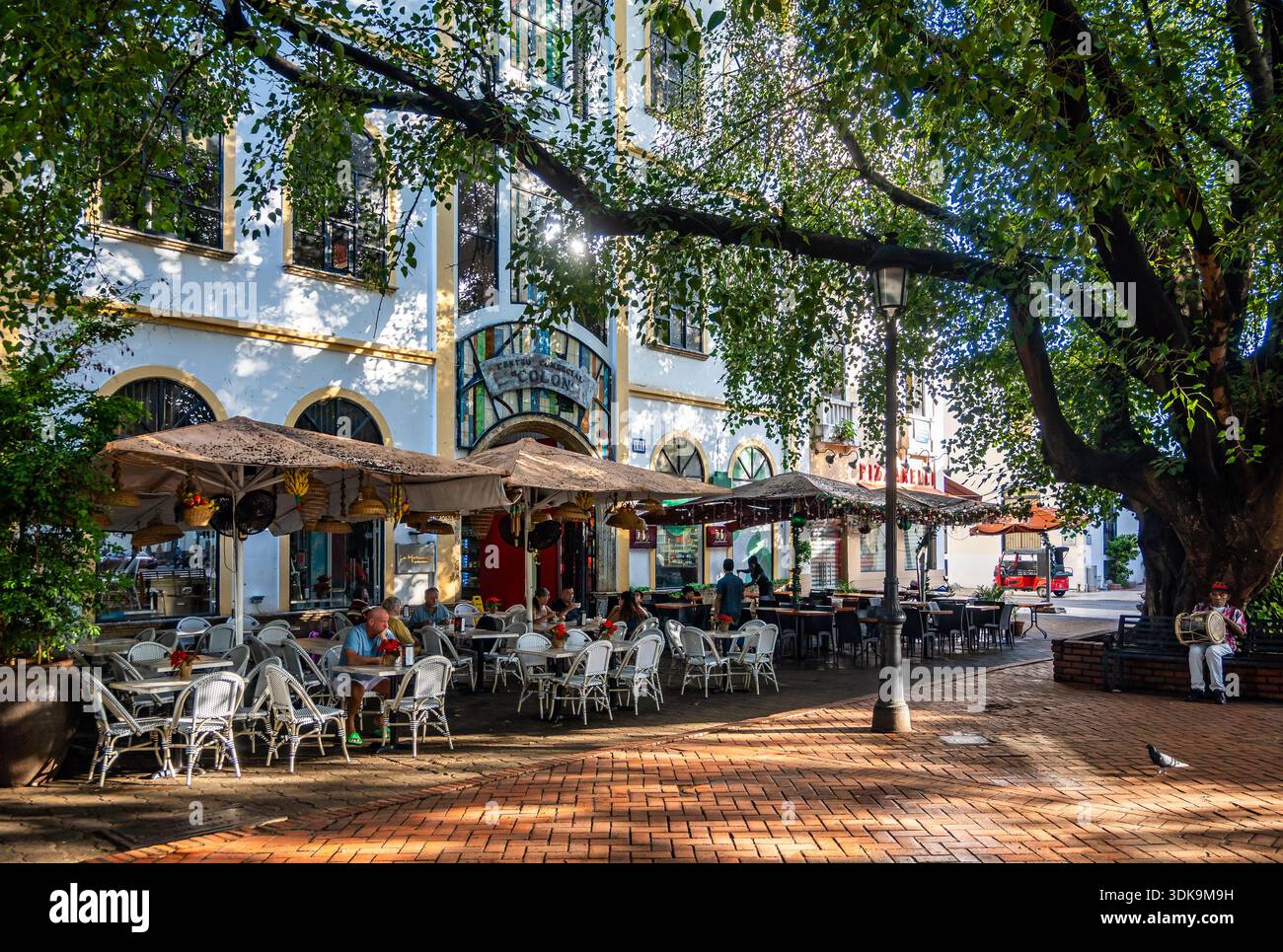 Colonial Zone Restaurants set up tables around the main square of the historic ...