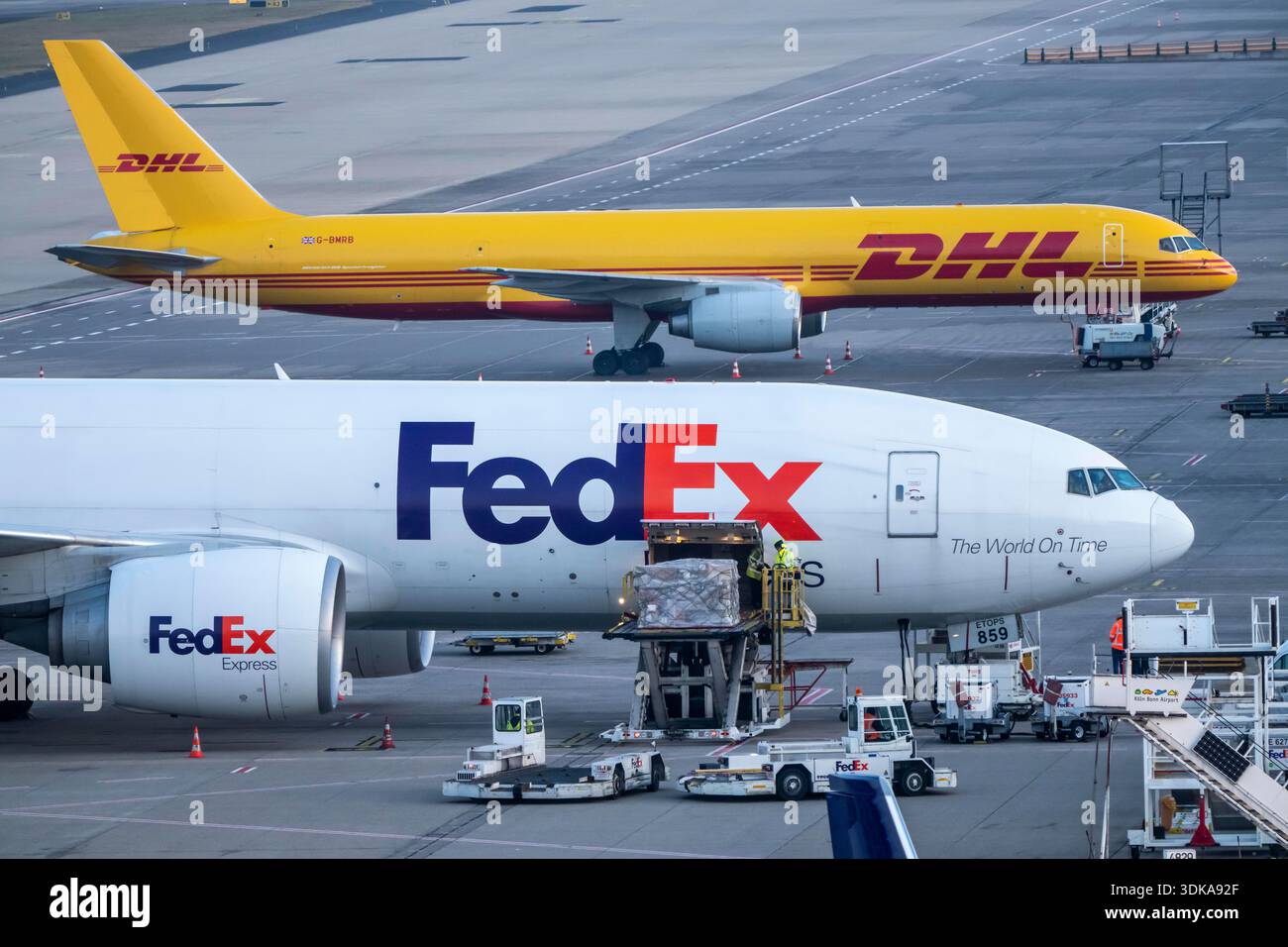 FedEx Express Boeing 777-FS2 cargo plane is unloaded, air freight