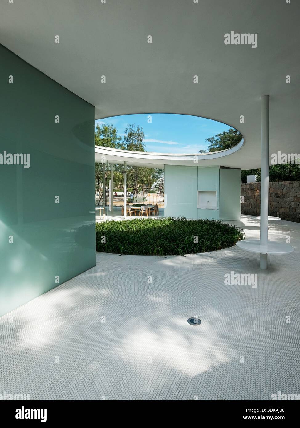 Interior view of a futuristic modern white building featuring a large ...