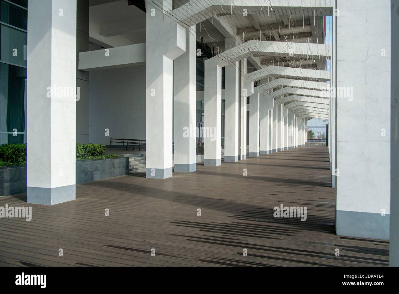 Column Over Side view of a series of white concrete columns supporting a structure ...