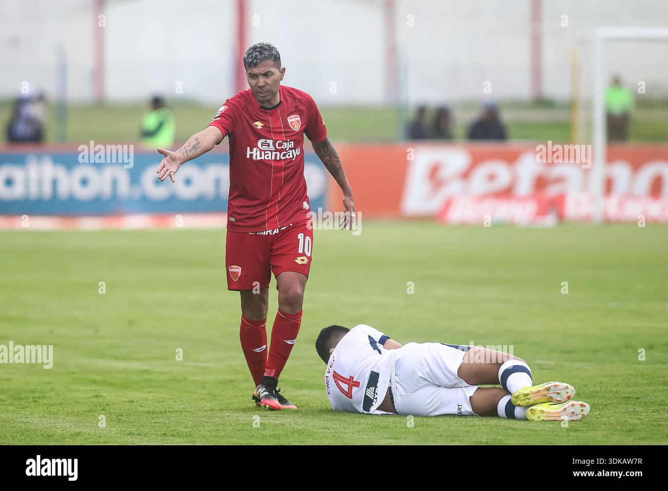Huancayo, Peru - Jannuary 30: Nahuel Lujan of Sport Huancayo and Gianfranco Chavez of Alianza Lima during the Liga 1 Peru match between Sport Huancayo and Alianza Lima at Estadio IPD Huancayo Huancayo, Peru - Jannuary 30: Nahuel Lujan of Sport Huancayo and Gianfranco Chavez of Alianza Lima during the Liga 1 Peru match between Sport Huancayo and Alianza Lima at Estadio IPD Huancayo