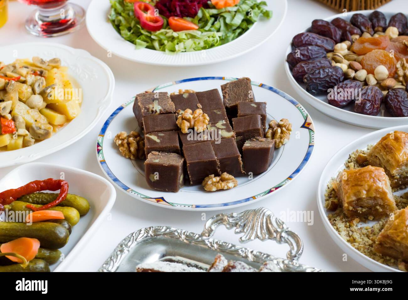 Traditional Turkish sliced halva with cocoa and walnuts, on the Ramadan ...