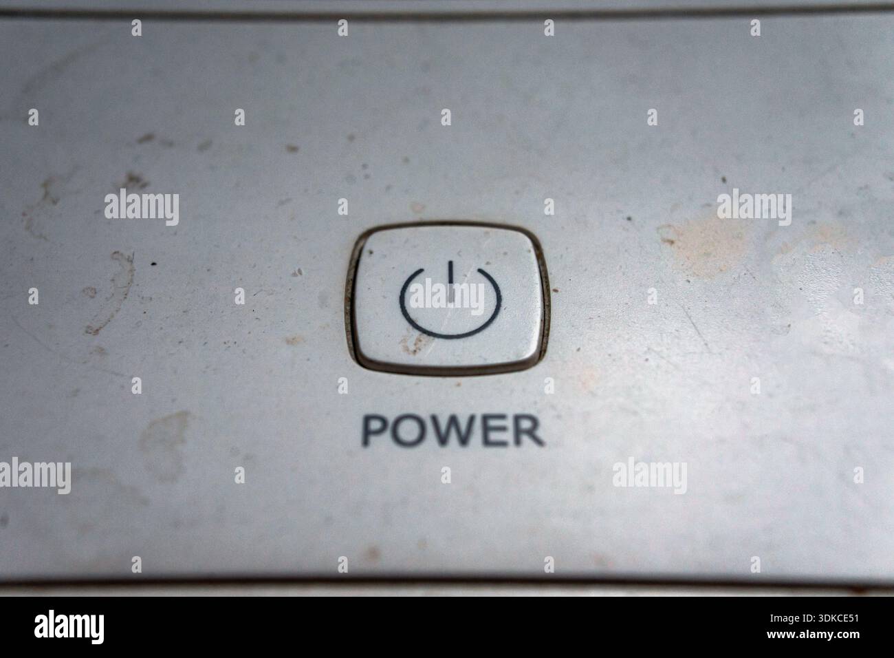 Macro composition of the plastic Power button on an old device. Stock Photo
