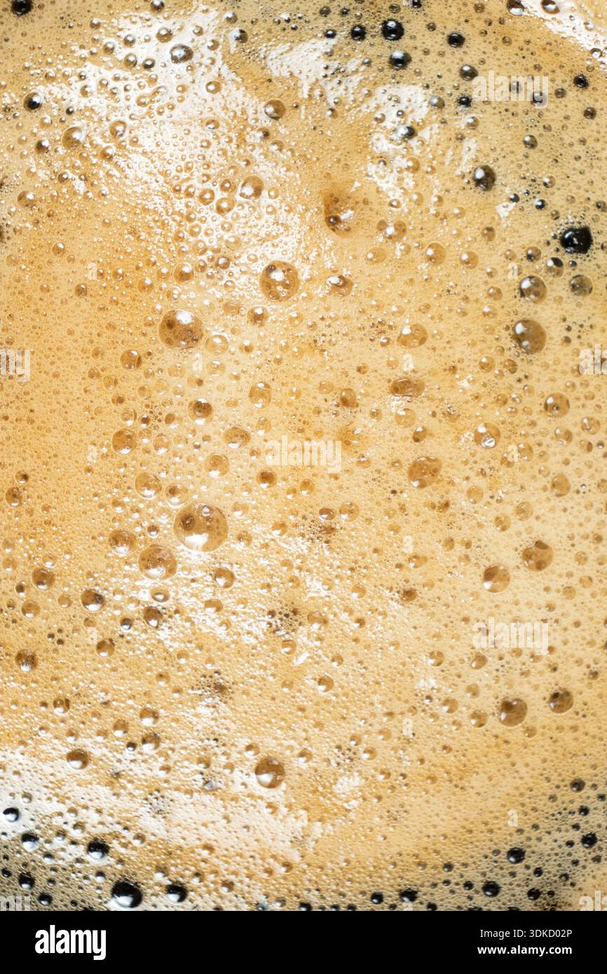 Brown and gold coffee bubbles texture for culinary background Stock Photo
