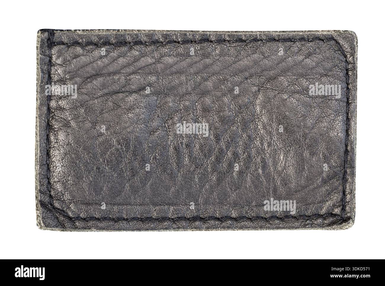 Black leather patch with stitch marks on transparent background, showing worn texture Stock Photo