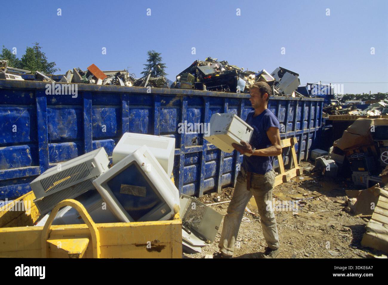 COMPUTER ELECTRONICS RECYCLING man carrying an old computer screen to ...