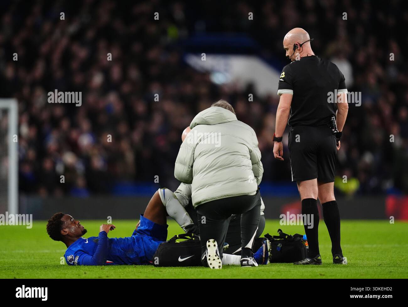 Chelsea's Jamie Gittens goes down injured during the Premier League ...