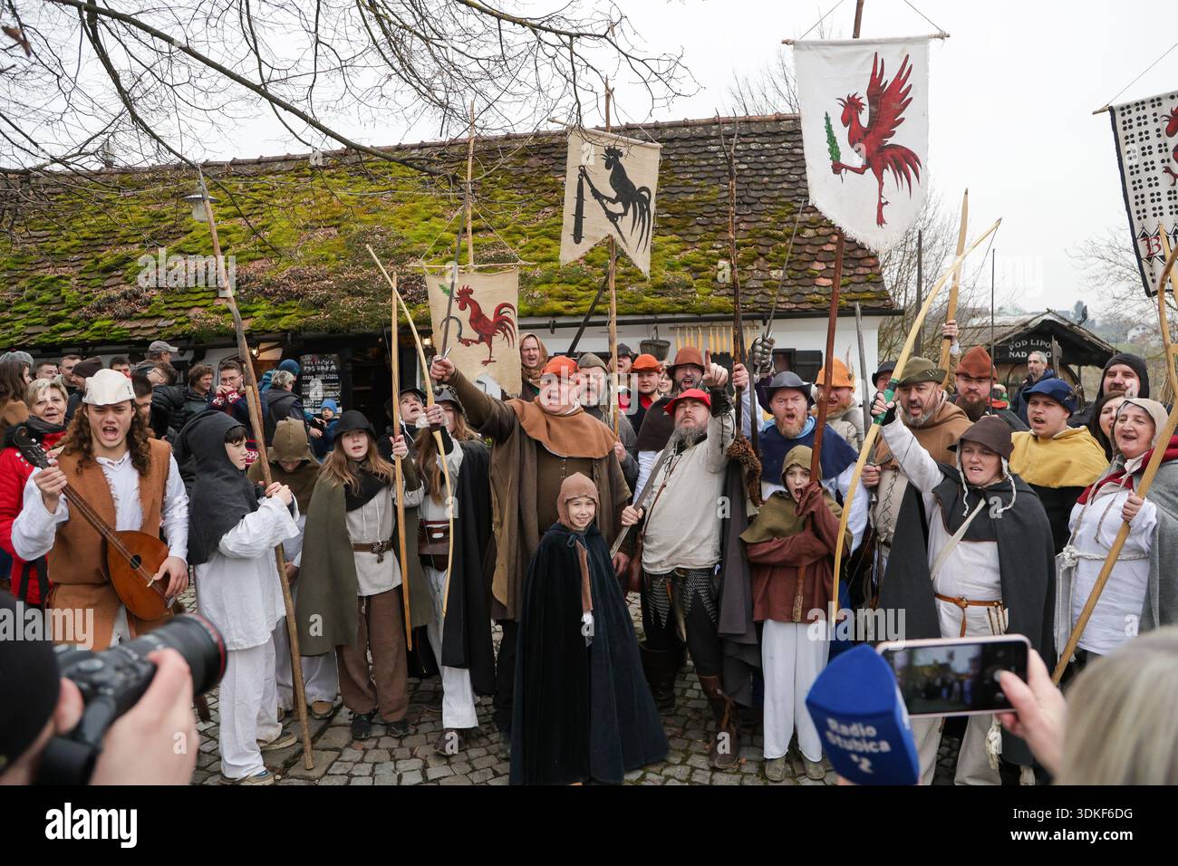 Peasant Symbol Participants dressed in Medieval costumes reenact 1573 Peasants Revolt ...