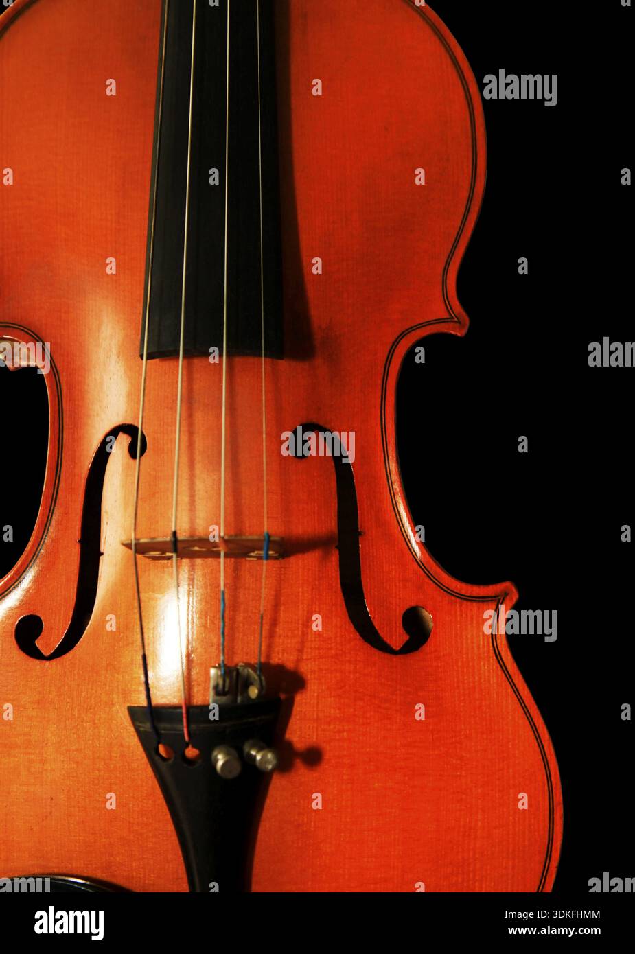1937 old violin on the black background Stock Photo