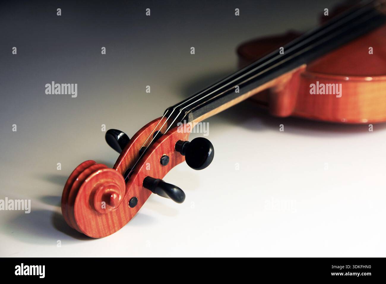 1937 old violin on the dim background Stock Photo