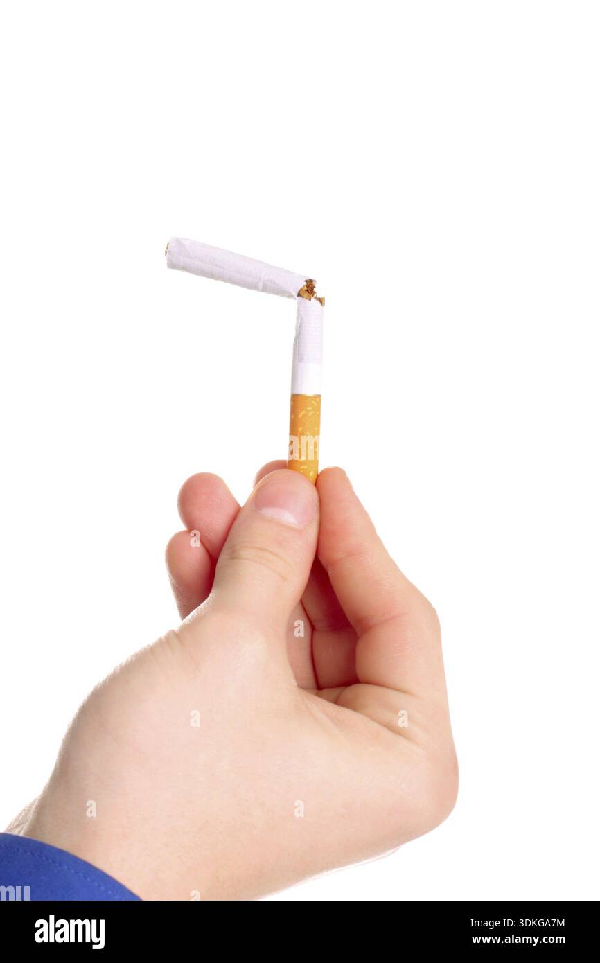 can you still smoke a broken cigarette Person with broken cigarette isolated on the white Stock Photo