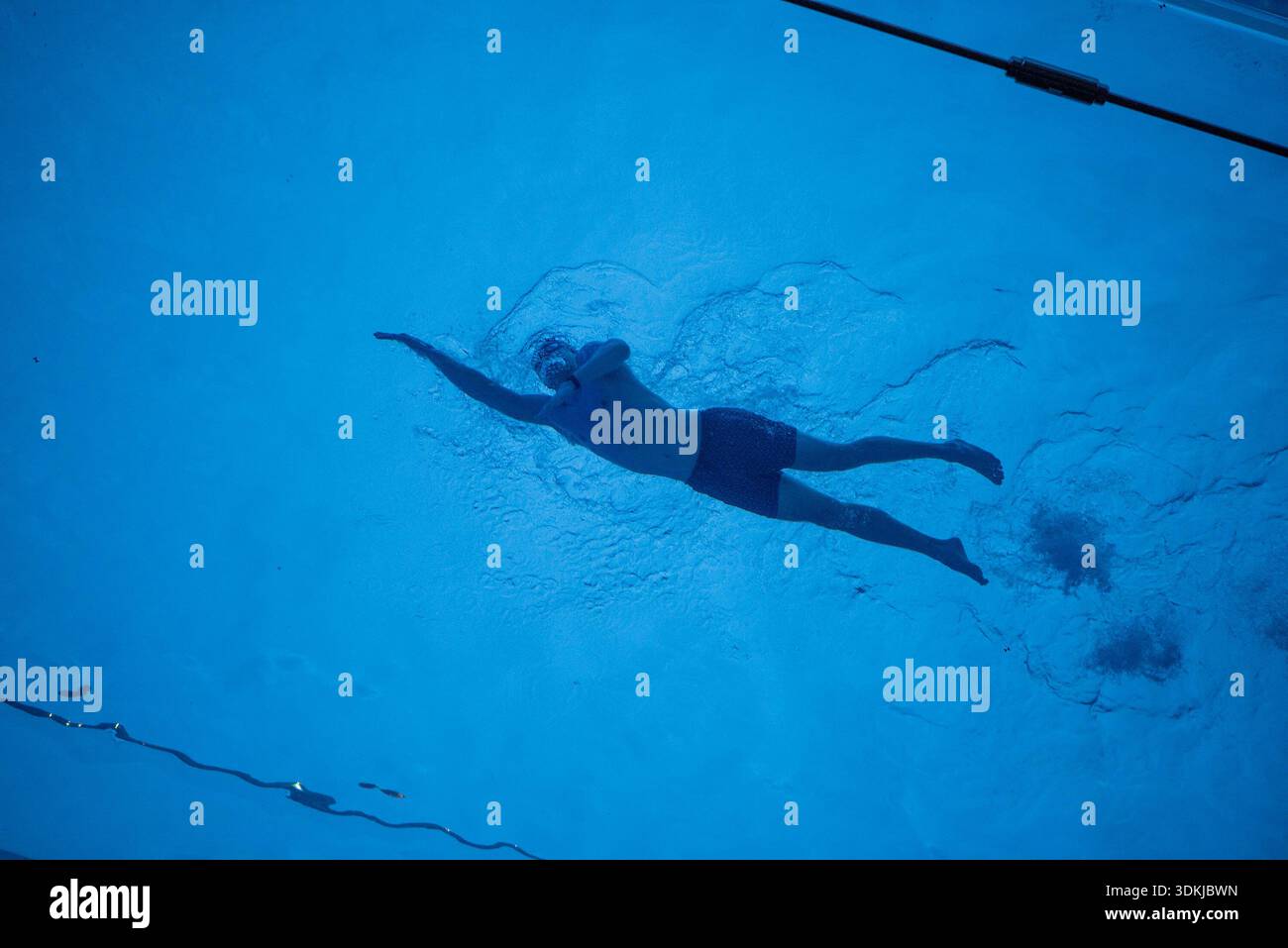 A swimmer swims at the Sky Pool. The Sky Pool at Embassy Gardens in ...