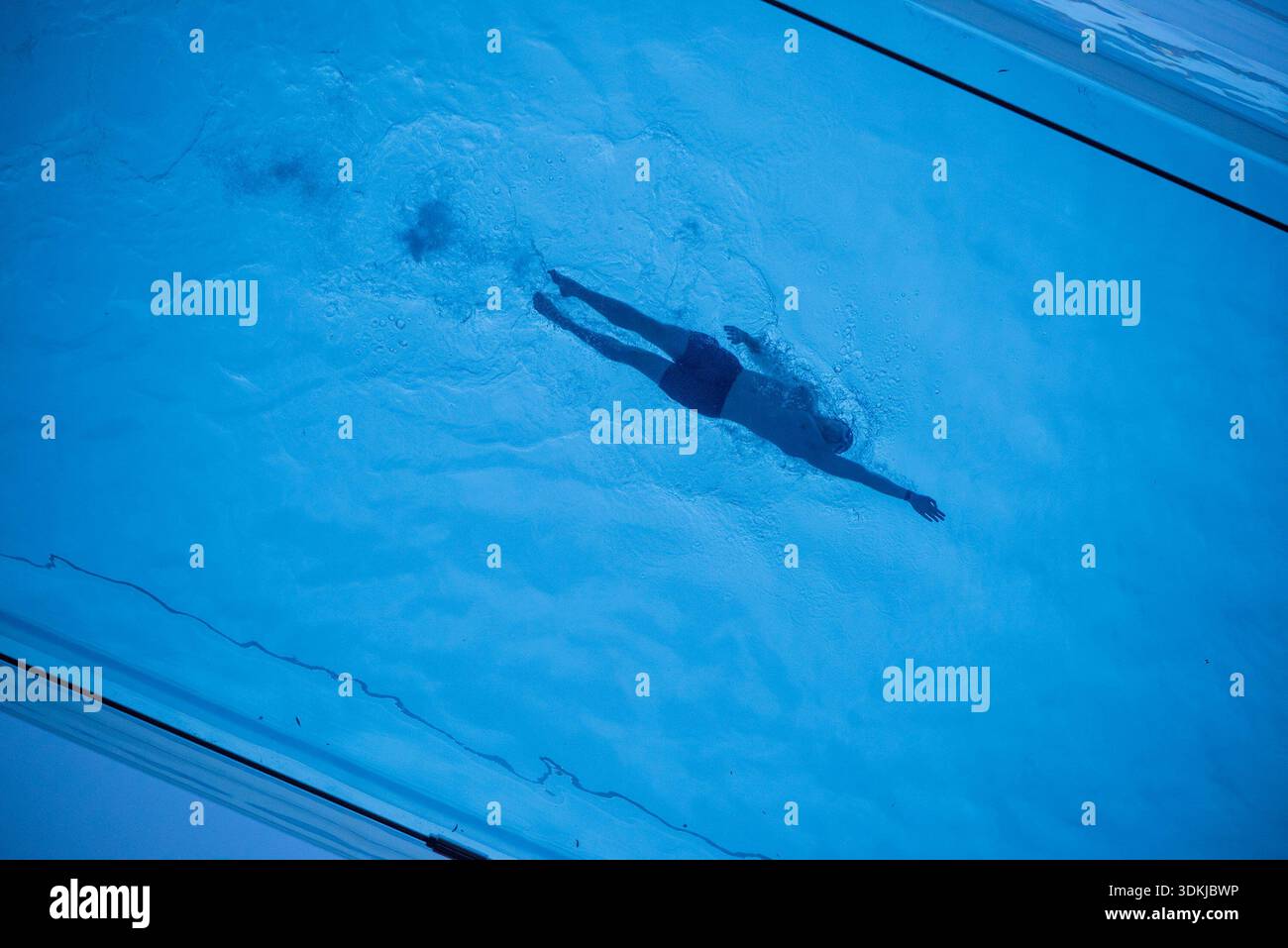 London, UK. 31st Jan, 2026. A swimmer swims at the Sky Pool. The Sky ...