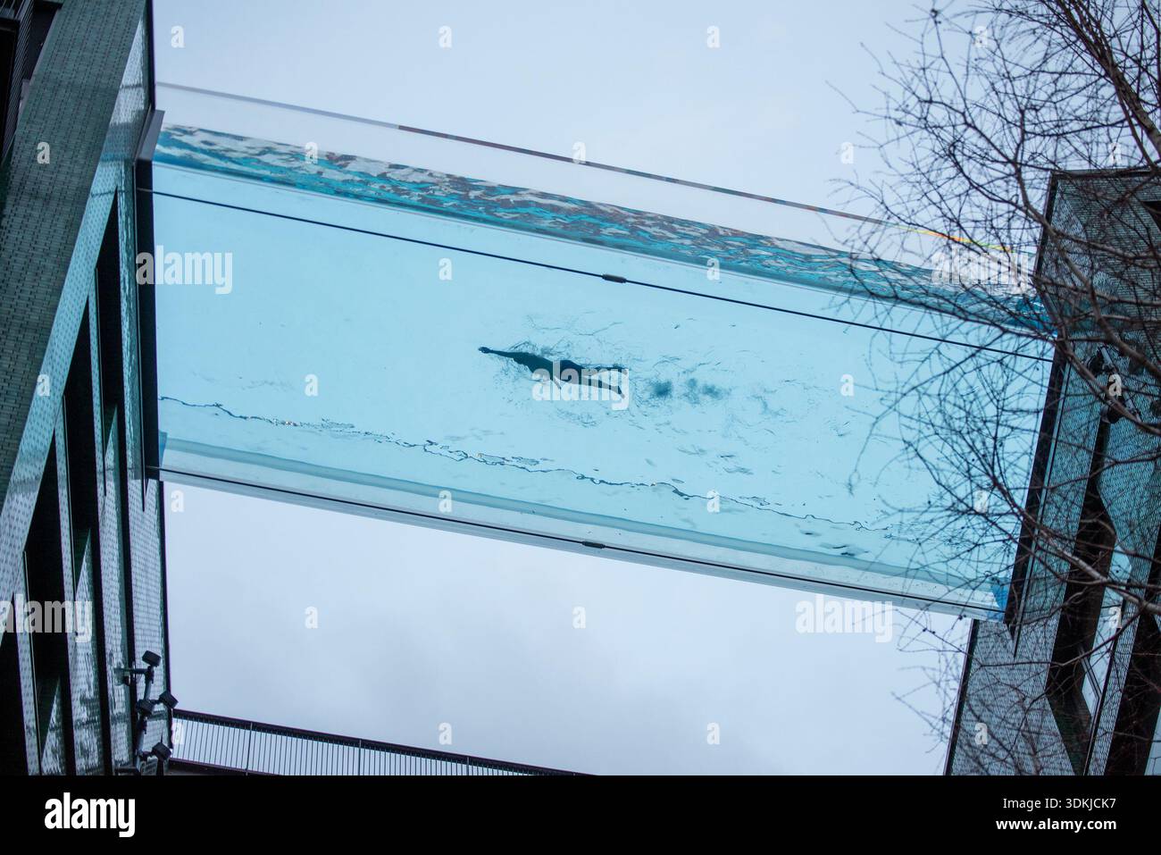 A swimmer swims at the Sky Pool. The Sky Pool at Embassy Gardens in ...