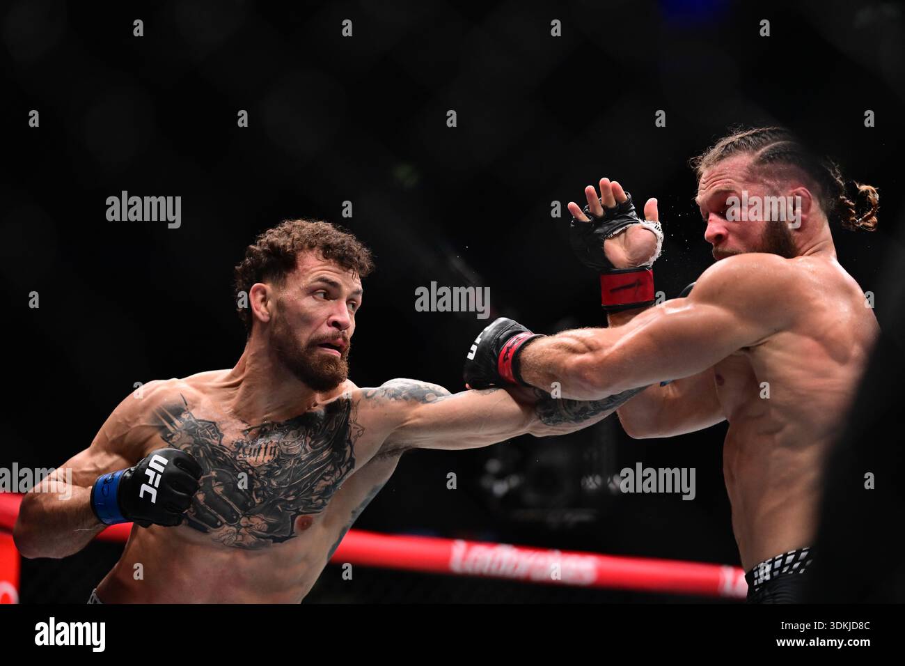 Mauricio Ruffy of Brazil (left) and Rafael Fiziev of Azerbaijan (right ...