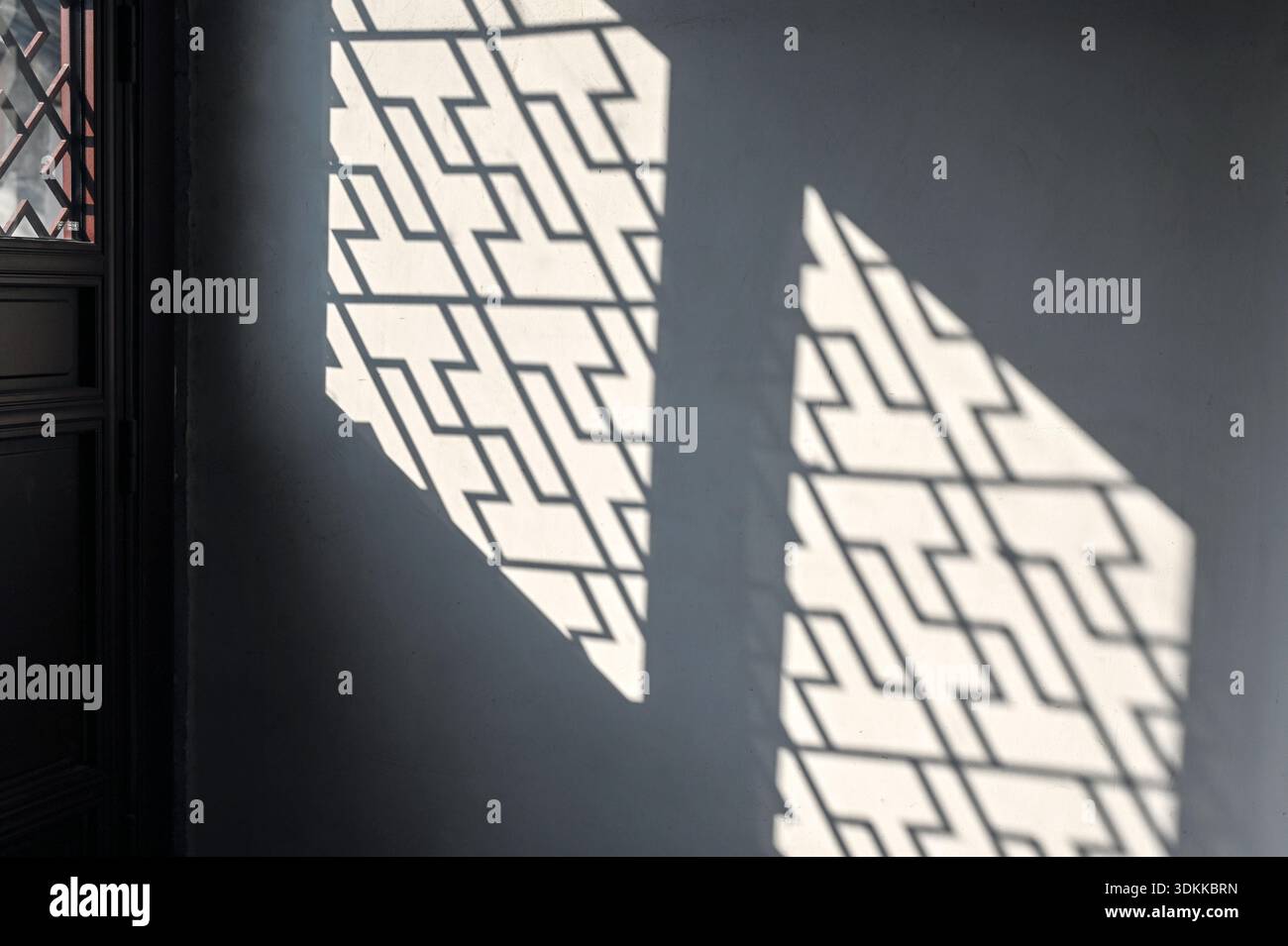 Silhouette with traditional Chinese pattern on the wall Stock Photo