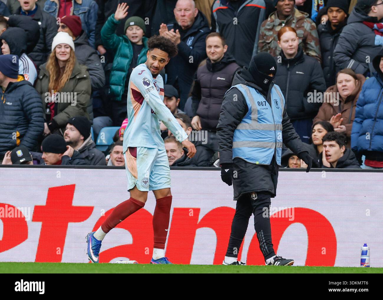 Birmingham, UK. 1st Feb, 2026. Kevin Schade of Brentford leaves the pitch  after he receives a red card from referee Tim Robinson during the Aston  Villa vs Brentford Premier League match at