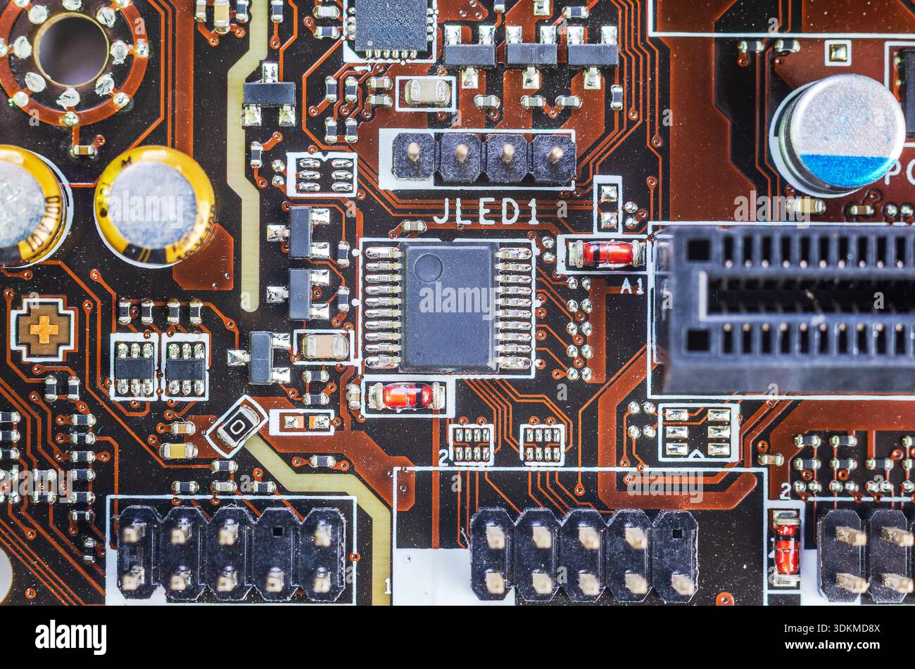 Detailed macro view of a complex electronic circuit board with ...