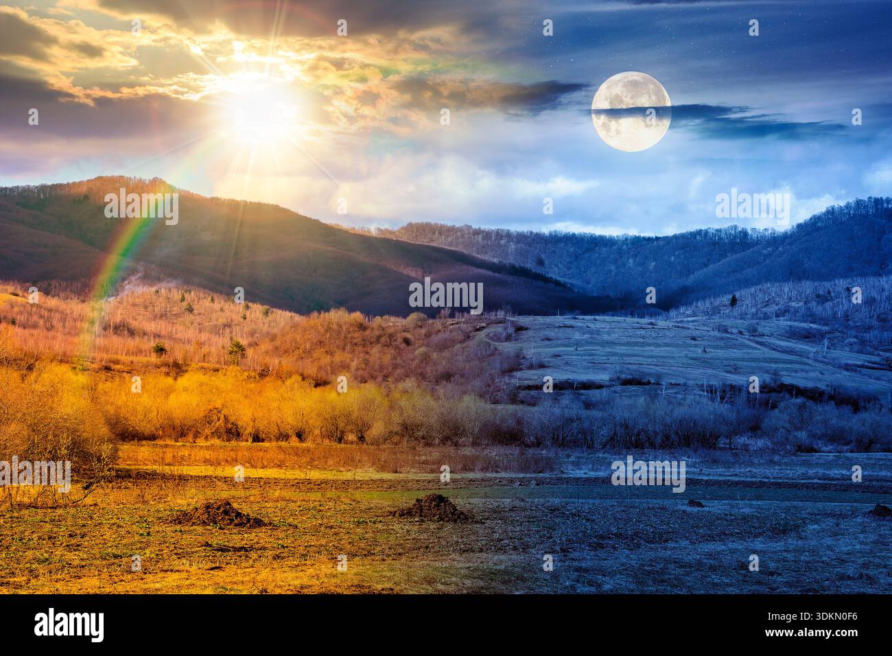 early spring rural landscape in mountains. day and night time change concept. beautiful view of countryside scenery with field in march with sun and m Stock Photo