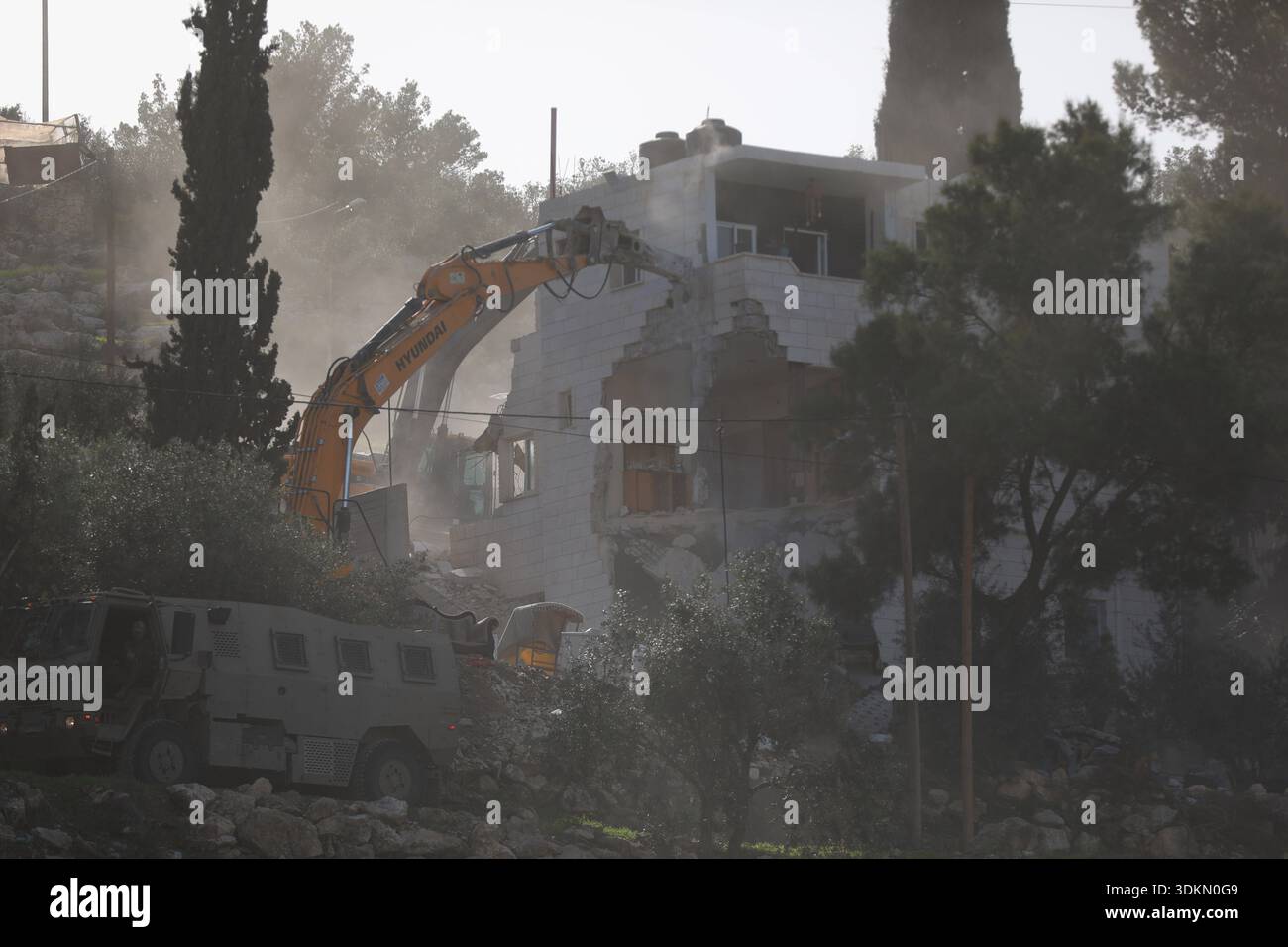 Israeli forces demolish a three-story Palestinian-owned house citing ...