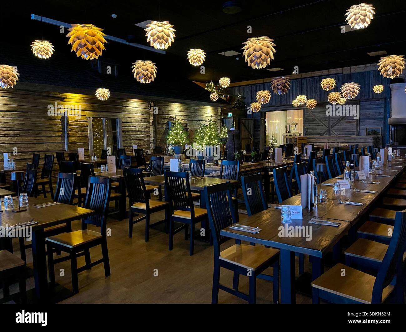 The warmly decorated interior of the restaurant in the Apukka Resort, Rovaniemi, Finland Stock Photo