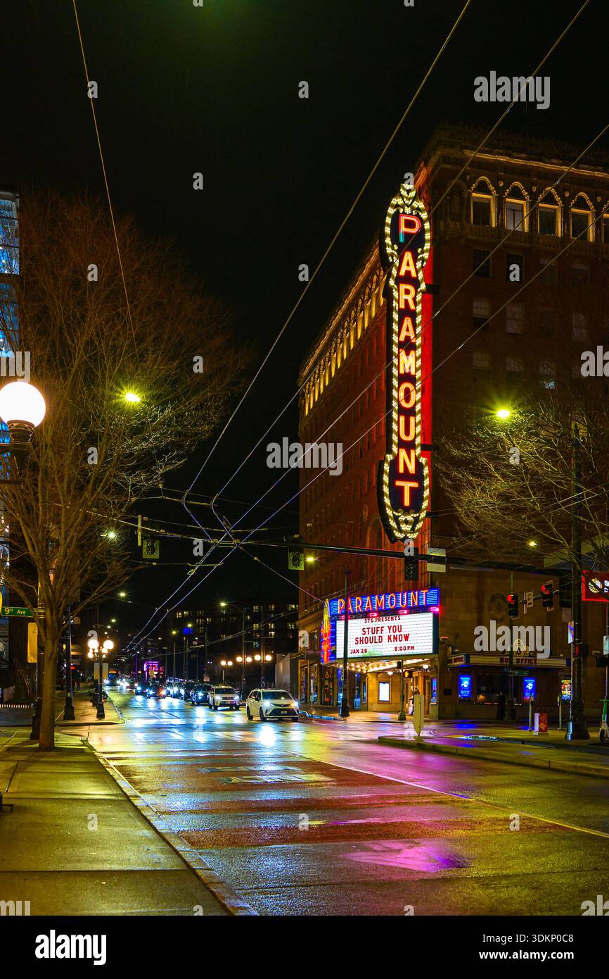 Seattle - January 28, 2026; Paramount Theatre in downtown Seattle at night with colors reflecting in wet street Stock Photo